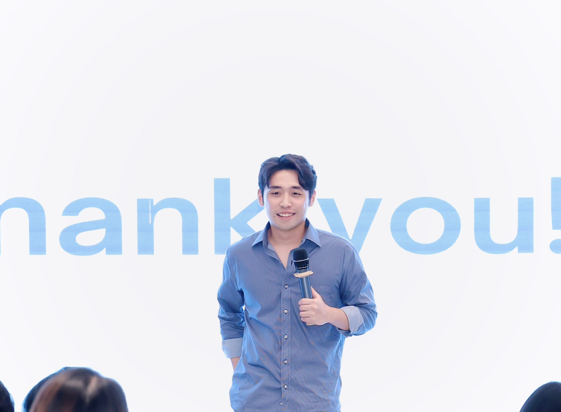 Barry Li speaking on stage